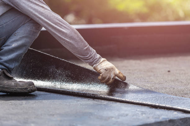 Professional Waterproofing technician working in Lacota, MI